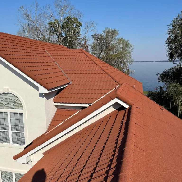 Clean red tile roof with river view after soft washing in Jacksonville, FL
